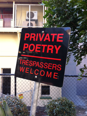 Sign reading: Private Poetry trespassers welcome